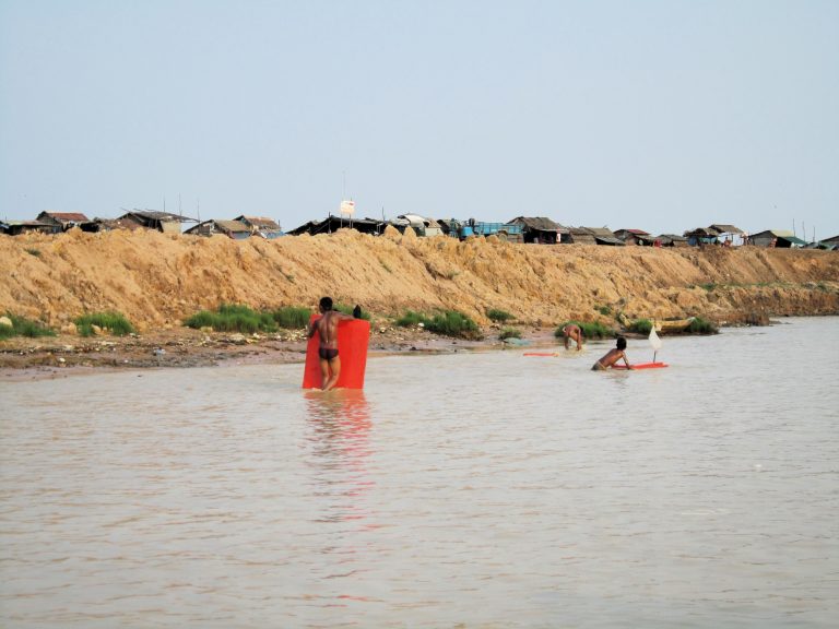 Life on the Tonle Sap. I rarely take images of people (power dynamics + voyeurism + ethics = grossly uncomfortable), but this was very early on in my life with a camera before I'd set my standards...