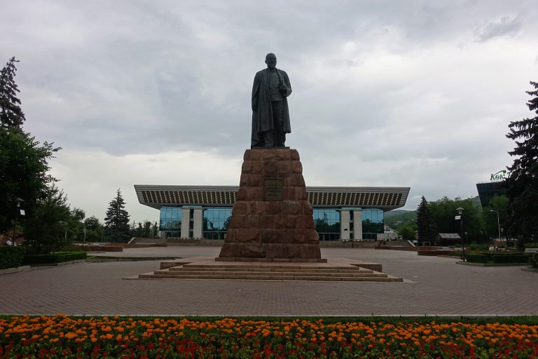 Republic Palace + a statue of Abay Kunanbayev
