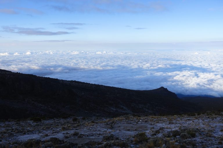 Awoke to nearby Mount Meru poking its head out of the clouds