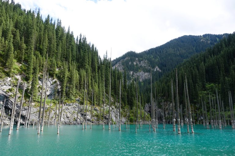 Known as the 'sunken forest', Lake Kaindy's famed for its colour (far more vibrant in person) and the tree trunks that have been preserved by its icy cold waters.