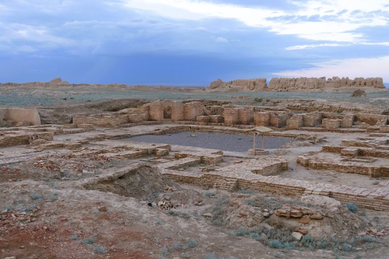 Many, many centuries ago, this was the largest city within the present borders of Kazakhstan, and the capital of the Mongol White Horde. At some stage during the 16th century, it ceased to be of importance, and gradually fell into disuse. Now, all that's left is a vast expanse of ruins, about 40km from Turkestan (the city that it helped flourish - and which precipitated its own decline - by providing the materials used to construct the mausoleum).