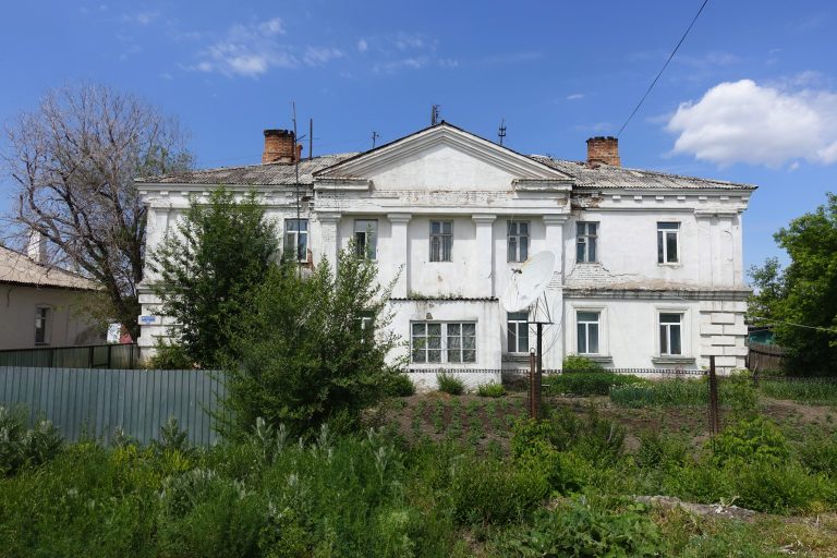 Strangely (to me), many of the buildings that were used as part of the gulag remain in the village today. I think this was the gulag 'hospital', which has now been converted into housing.