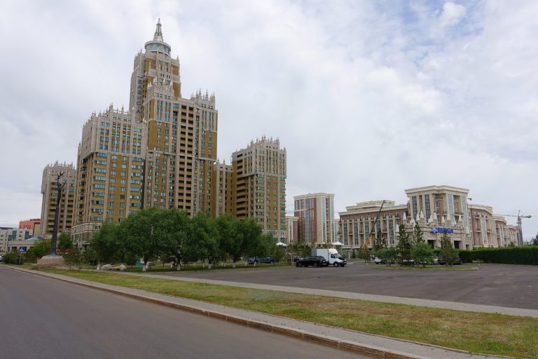 Architecture here is done on a grand scale. Giant and/or crazy buildings (alongside lots and lots of construction). Big, wide avenues too.