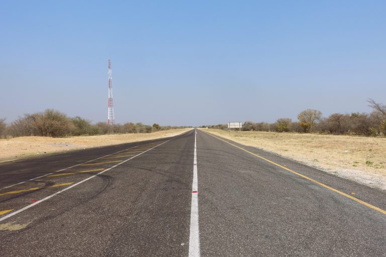 The highway to Namibia, where I endured a torturous wait in the blazing heat before getting picked up by a minivan full of Zimbabwean migrant workers!