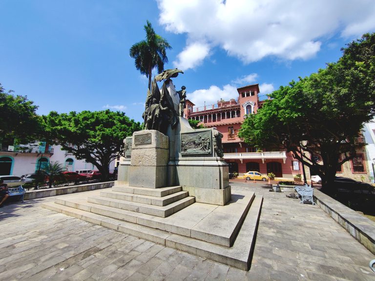 Plaza Simón Bolivar, a charming, quiet square surrounded by old colonial buildings.