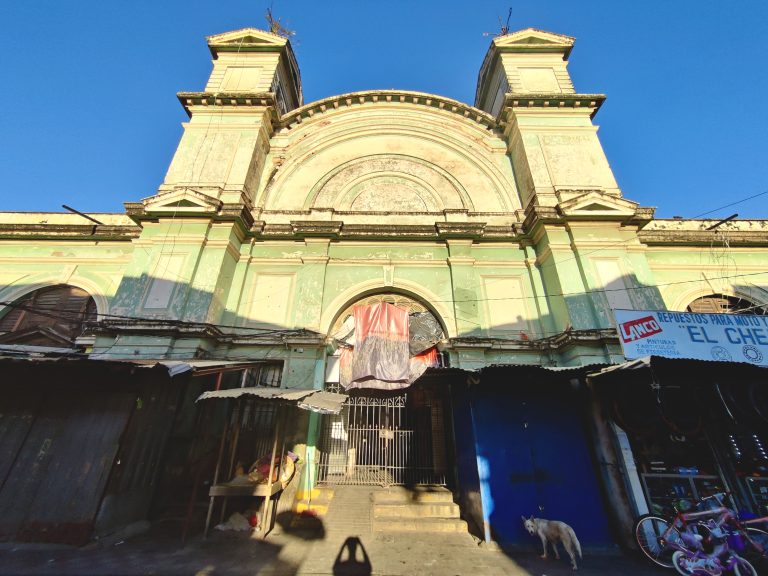 Outside the city's main market. Not sure what the building sporting all that faded colonial grandeur was, but it was fun to look at.