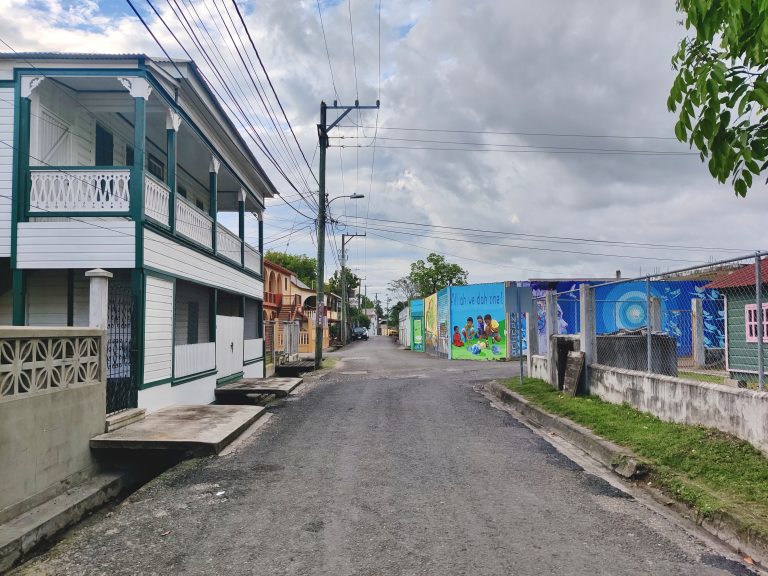 Some of the better-looking homes with street art in distance.