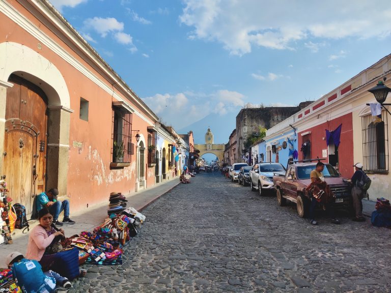 Love this shot which captures arch, volcano, and (inadvertently) locals street sellers too.