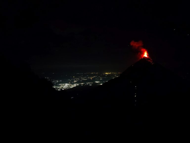 I slept for only three hours. It took me a while to doze off as I could hear Fuego erupting ever more thunderously during the middle of the night (the eruptions become more lavish with decreasing temps, or so I was told). It was hard to resist going back outside and staring, but it was also so damn cold that I couldn't remove myself from the blankets + sleeping bag I'd burrito'd myself into. This was what greeted me as I began the summit to Acatenango at 4:30am.