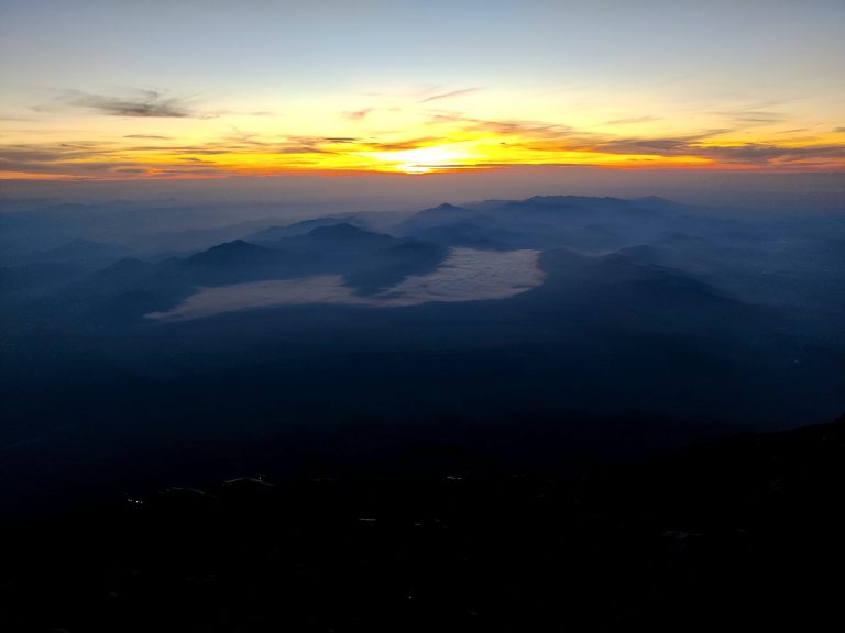 Same place five mins later. Turns out we didn't actually get a 'clear' sunrise. But that's okay, it was still majestic being atop one of the world's most iconic mountains some 3700m high.