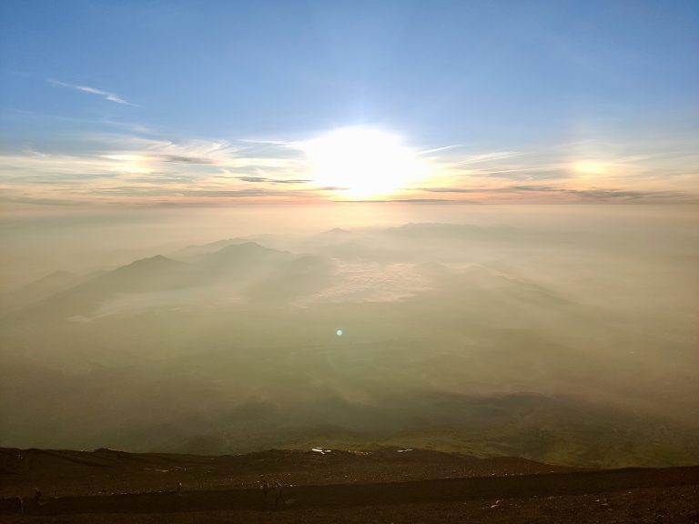 Sun properly risen and shining bright on my way down. I'd actually *removed* my windbreaker and done most of the summit climb with only one layer, so mild were the weather conditions that night (we were blessed). Put the windbreaker and gloves back on while waiting 90 mins for sunrise as it was freezing up top and I swear my fingers almost got frostbite. But as soon as the sun was back up I had to remove all top layers and switch back to a vest cos it was so damn hot...