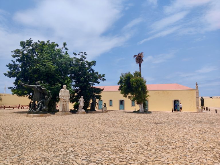 One last look at the fortress + the only other tourists in the city (99% of other visitors to Angola are Portuguese, which makes sense). From here I wandered over to the city's only vegan restaurant on its 'Ilha' (a spit off the shore). It was about a 30-45 min walk from the fortress IIRC, and took me through some pretty dodgy areas. I was followed multiple times during the walk, but luckily I have eyes on the back of my head and was smart enough to keep myself close to main roads and visibly-populated areas at all times until I was able to shake each guy off. Eventually made it to vegan food in one piece!