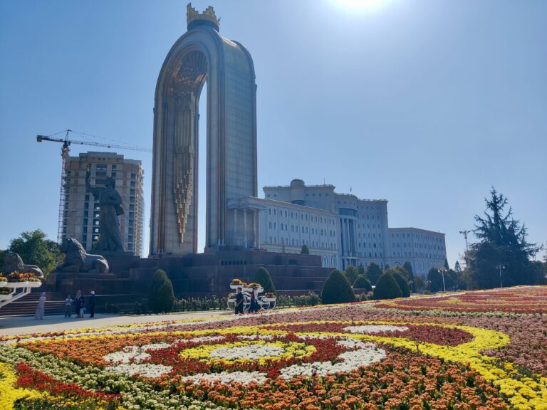 Flowers. Ismail Somoni Monument. Random ppl. And the enormous National Library over on the right.
