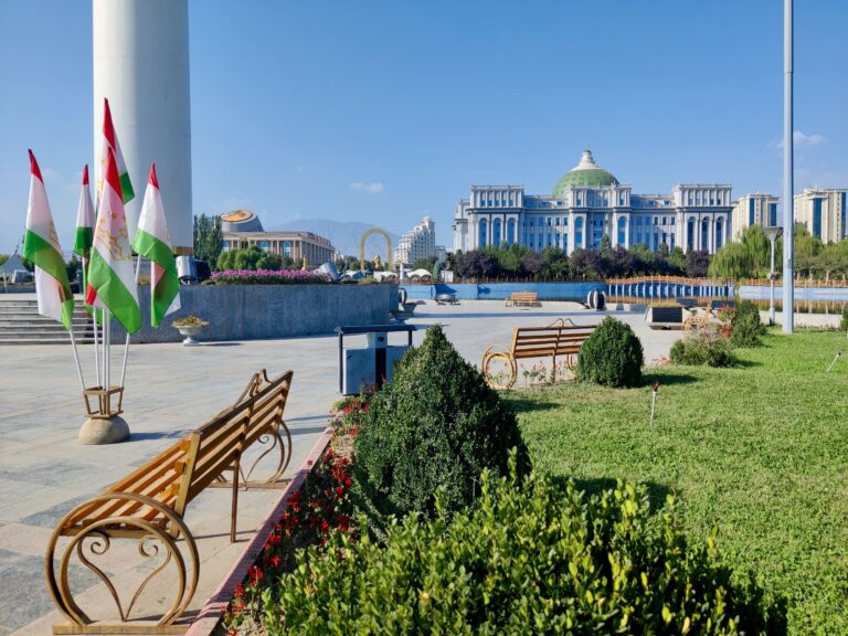Flags. Part of flagpole. National Museum on the left, National Theatre on the right. Everything amplified to massive scale. And unnervingly devoid of humanity. Oh, Tajikistan...