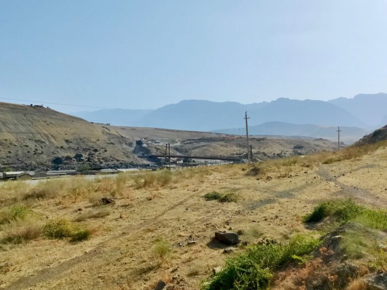 Once you're in the GBAO, you're basically driving alongside Afghanistan for days. Sometimes you're so close that you can actually throw rocks to the other side. We stopped here to have a closer look at the other side. A bridge that's not in use, and a Taliban hut visible atop the hill.